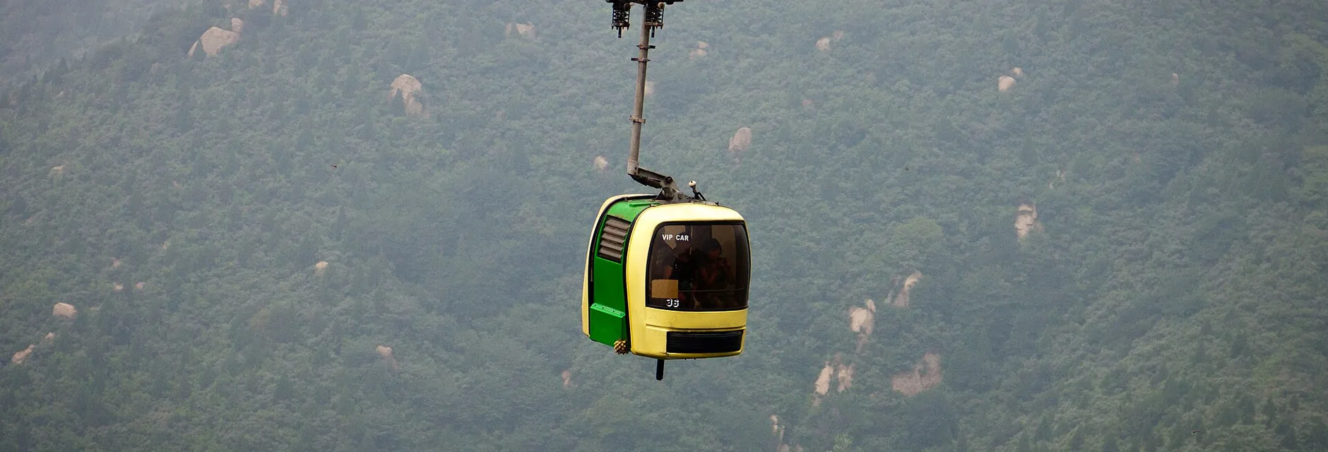 Cable car cabins ascending toward the Badaling Great Wall