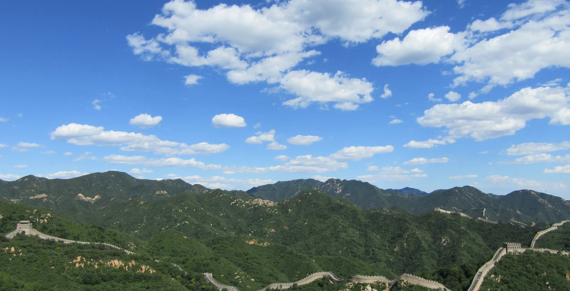 Badaling Great Wall on a clear day with visitors on the restored ridge