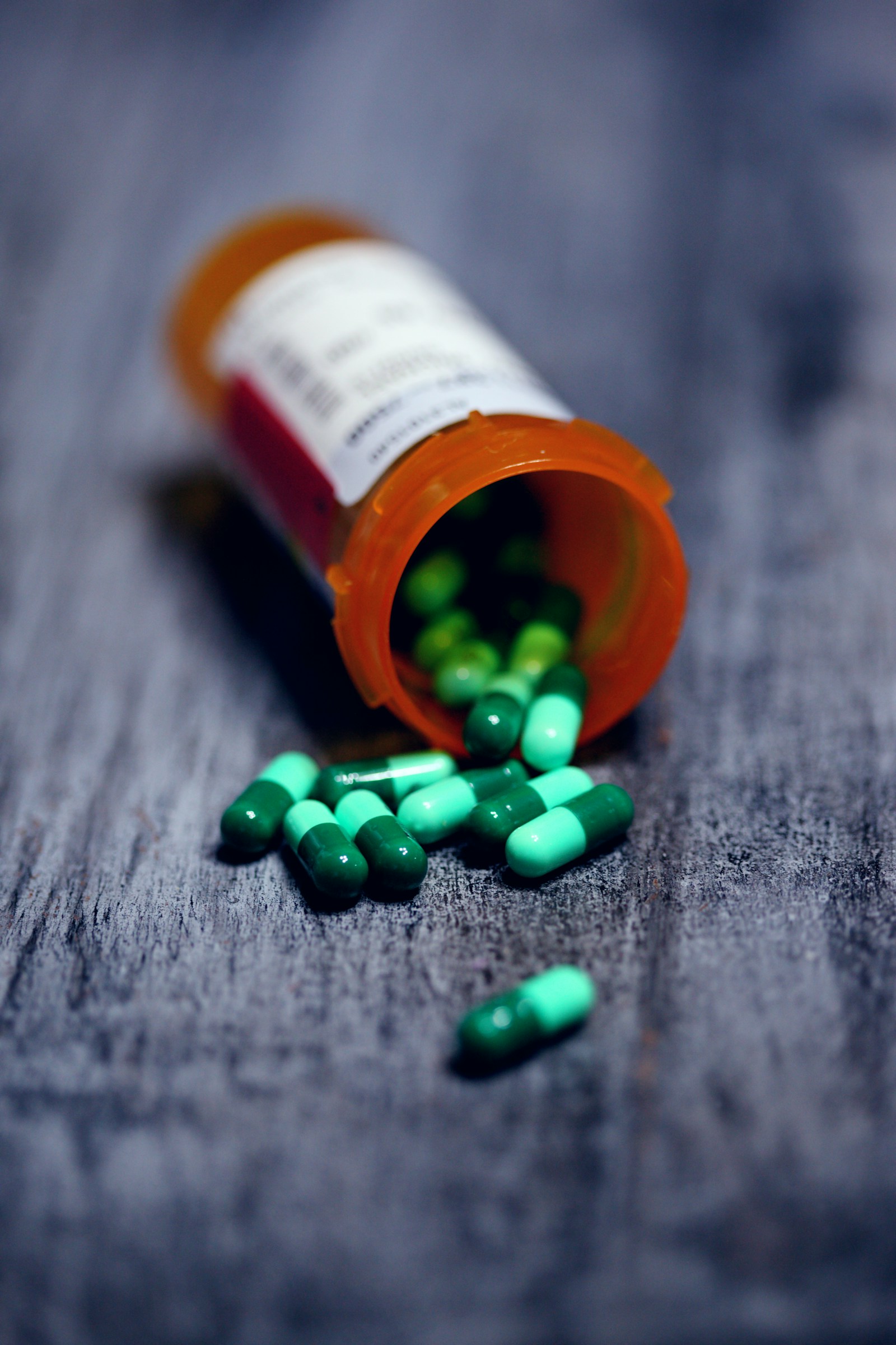 Example prescription-labelled medication bottle with capsules