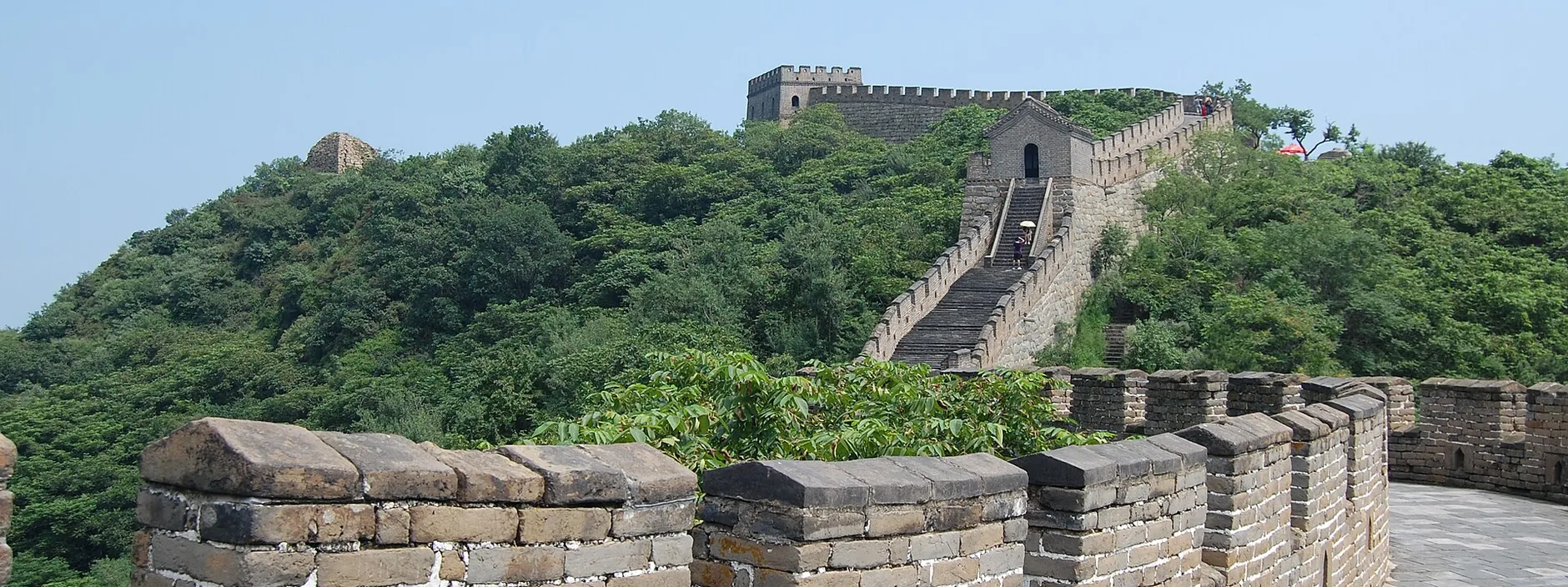 Mutianyu Great Wall ridge over greener rolling hills