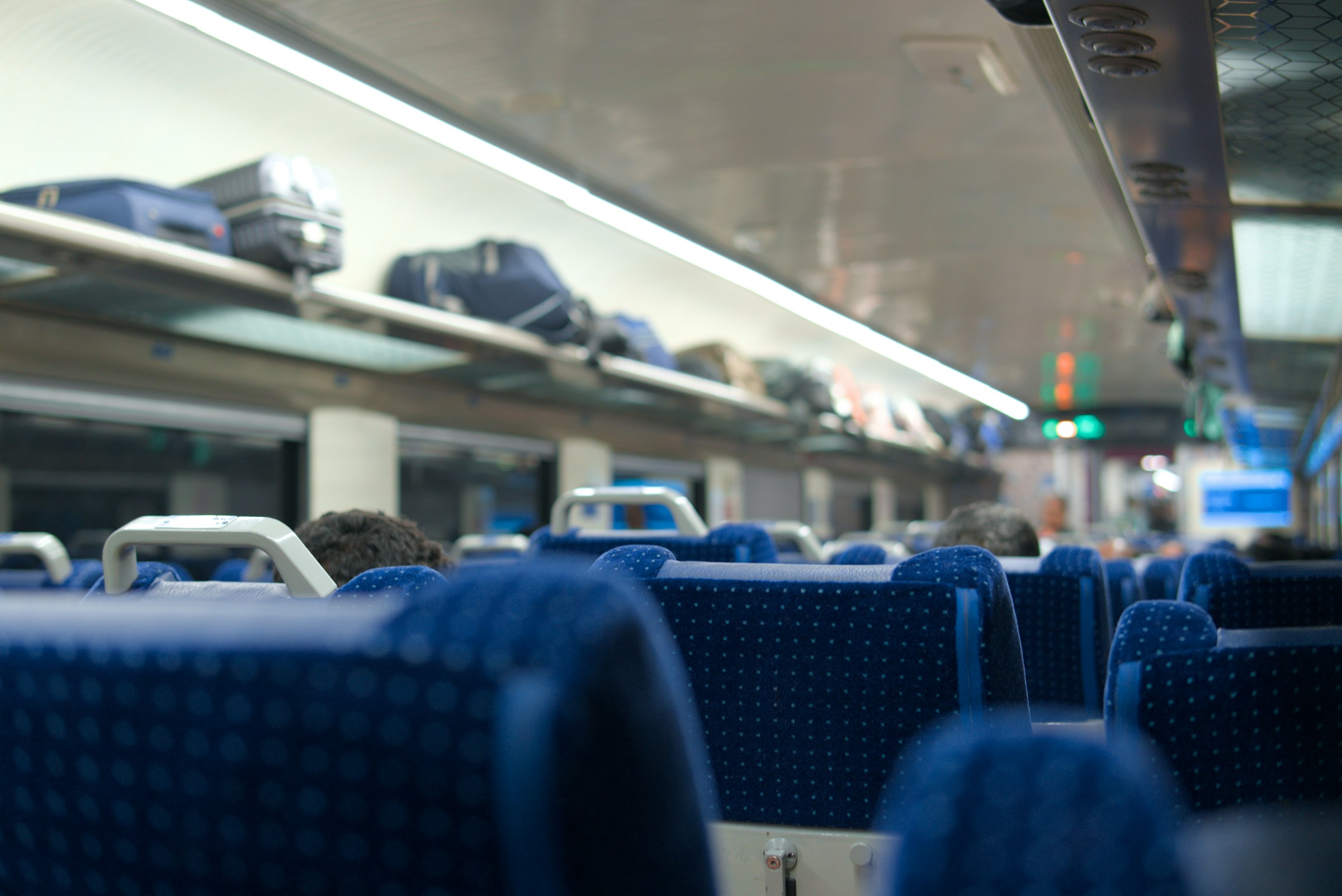 Existing railway baggage context photo, not evidence of a booked Light Travel pickup